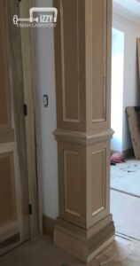 Wainscoting​ Column, shoe molding and wooden door