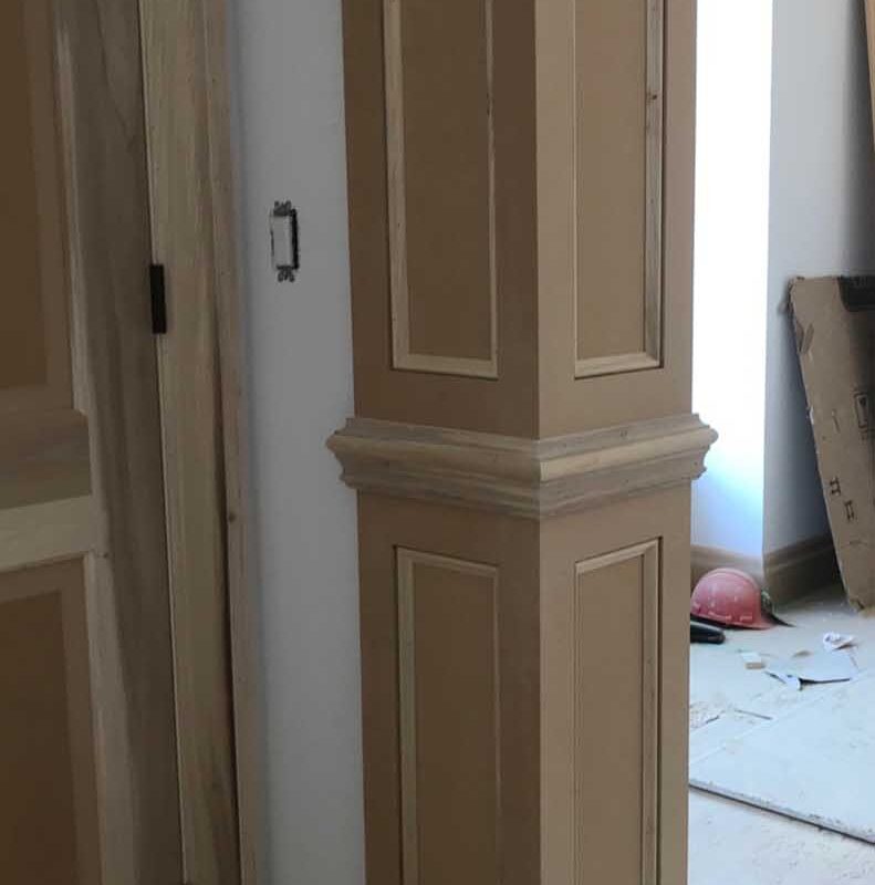 Wainscoting​ Column, shoe molding and wooden door