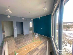 Room with our wooden floors, getting ready to place the baseboards